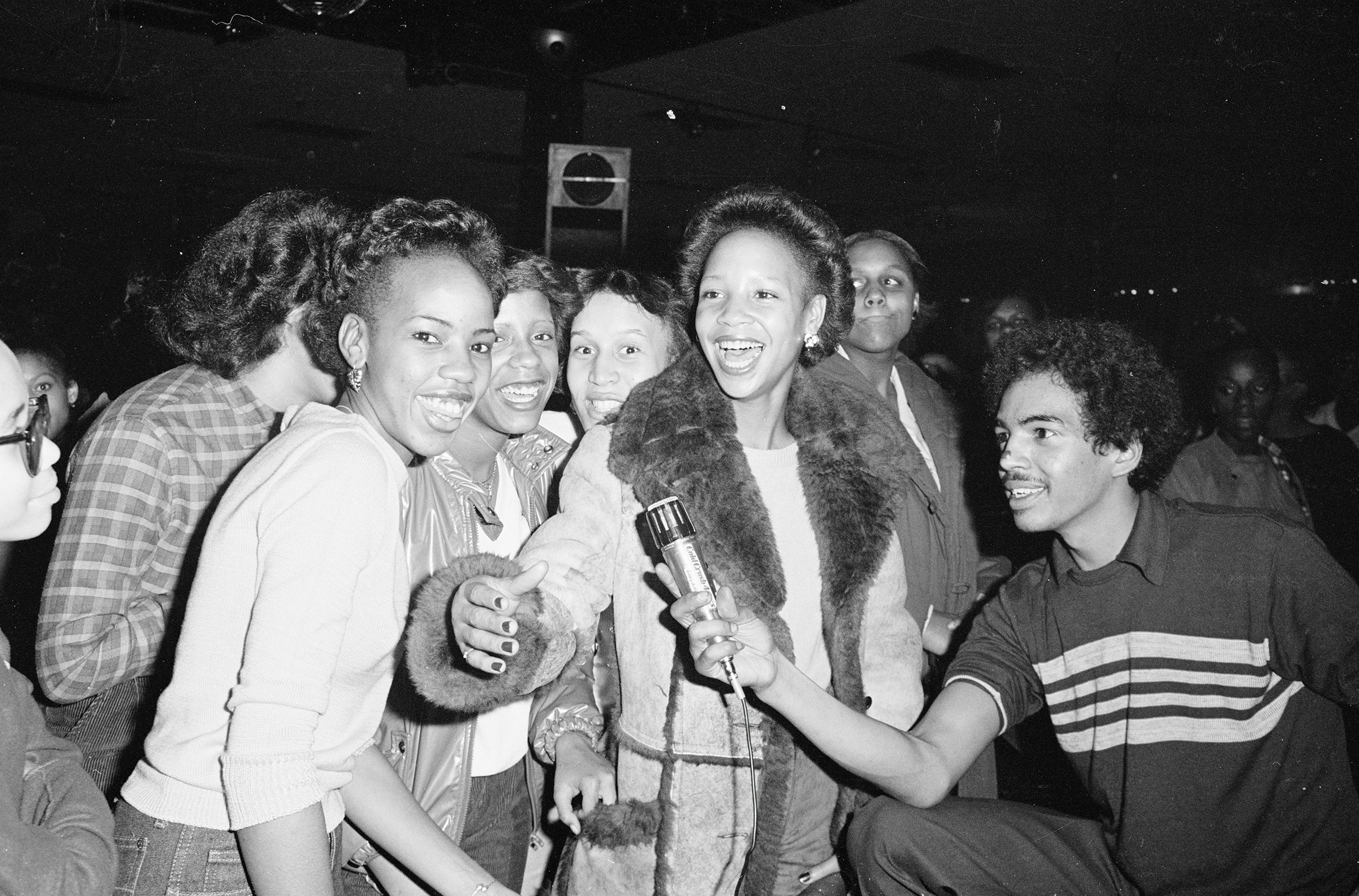 Wimpy amping up the crowd at Harlem World. Photo by Joe Conzo.